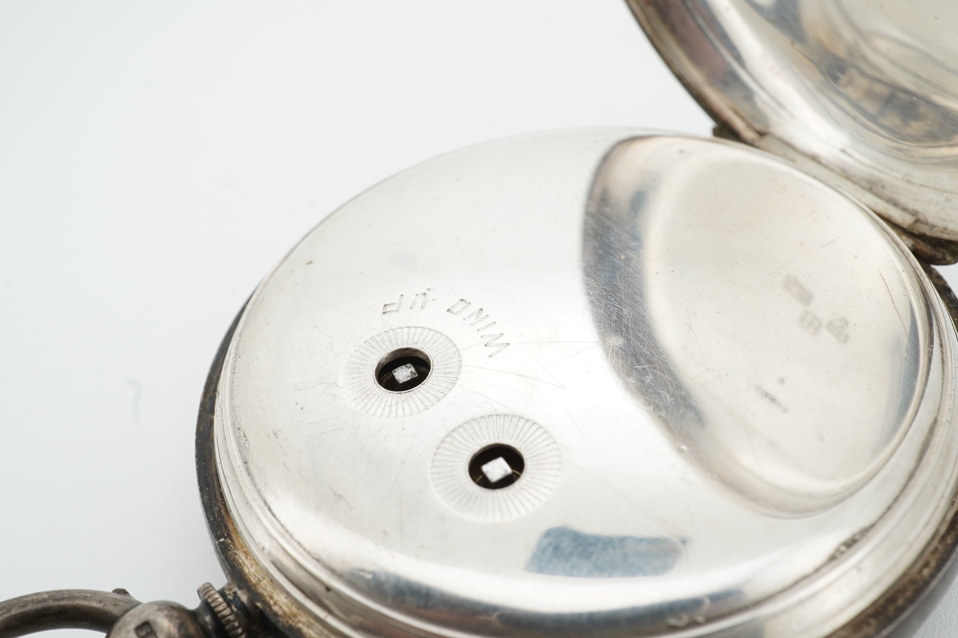A late Victorian silver open faced keywind chronograph pocket watch, by J. Hargreaves & Co of Liverpool, with Roman dial, case diameter 54mm, together with a metal albert.